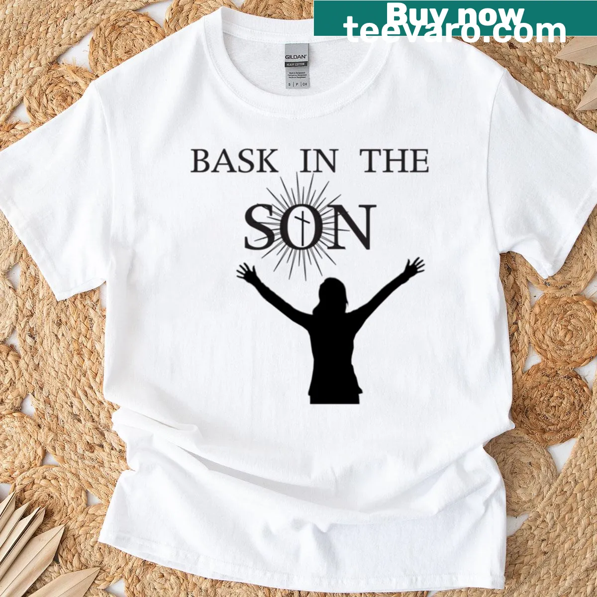 Female T-shirt with inspirational 'Bask In The Son' typography — on a men's t-shirt