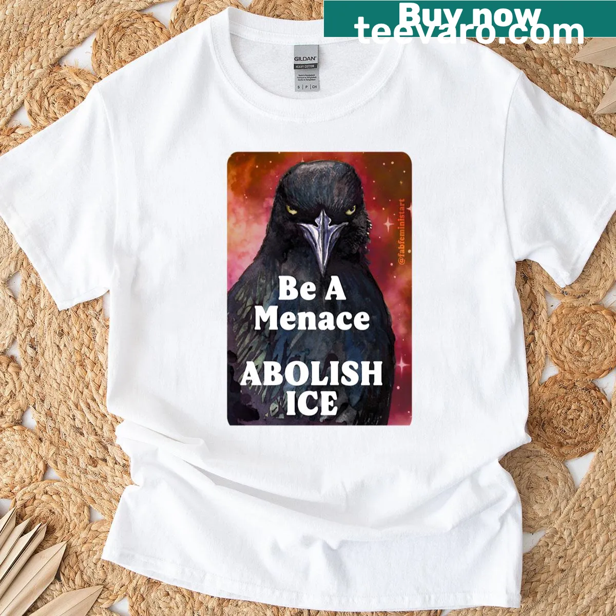 Bold text stating 'Be A Menace Abolish Ice' on T-shirt — on a men's t-shirt