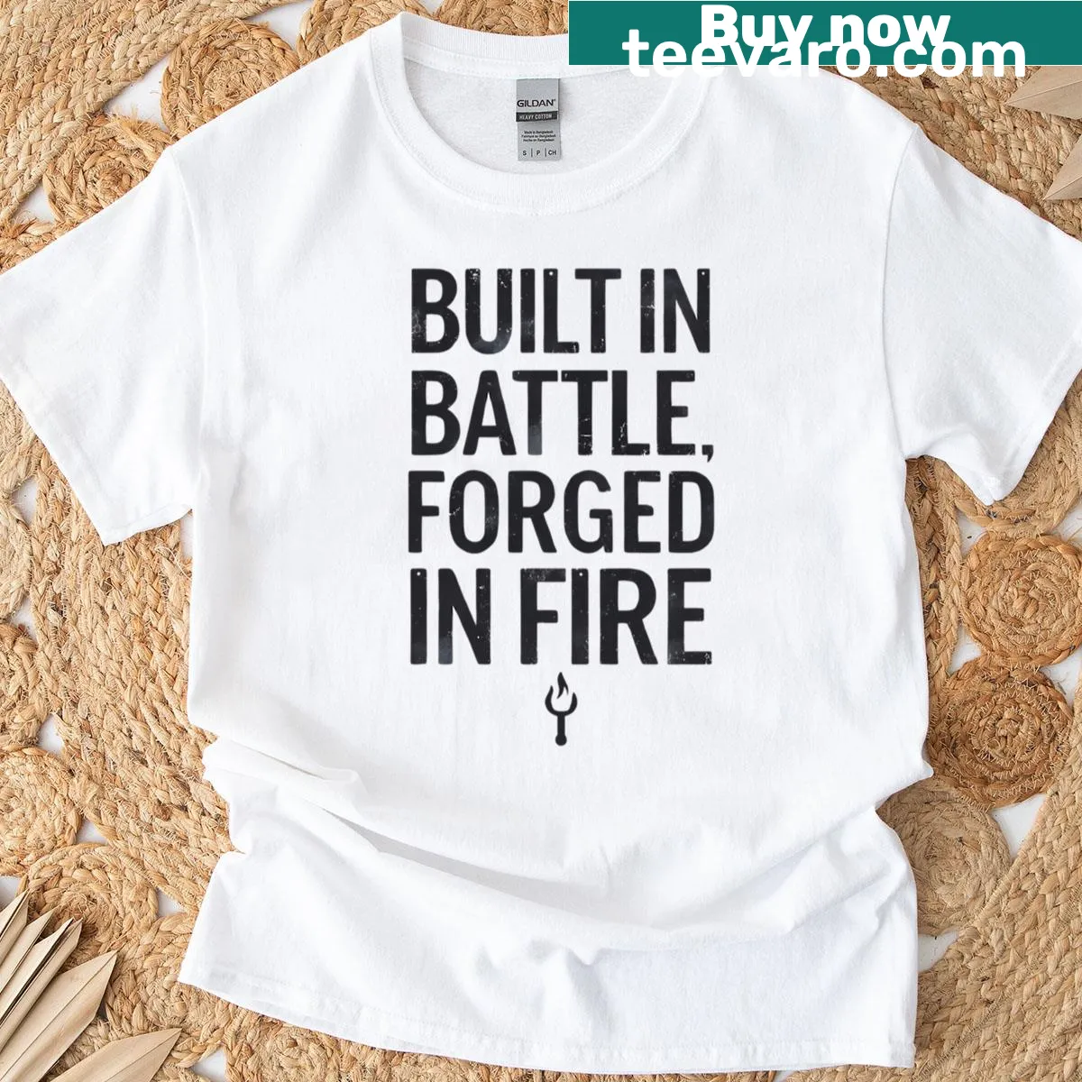 Minimalist T-shirt with 'Built In Battle' text design — on a men's t-shirt