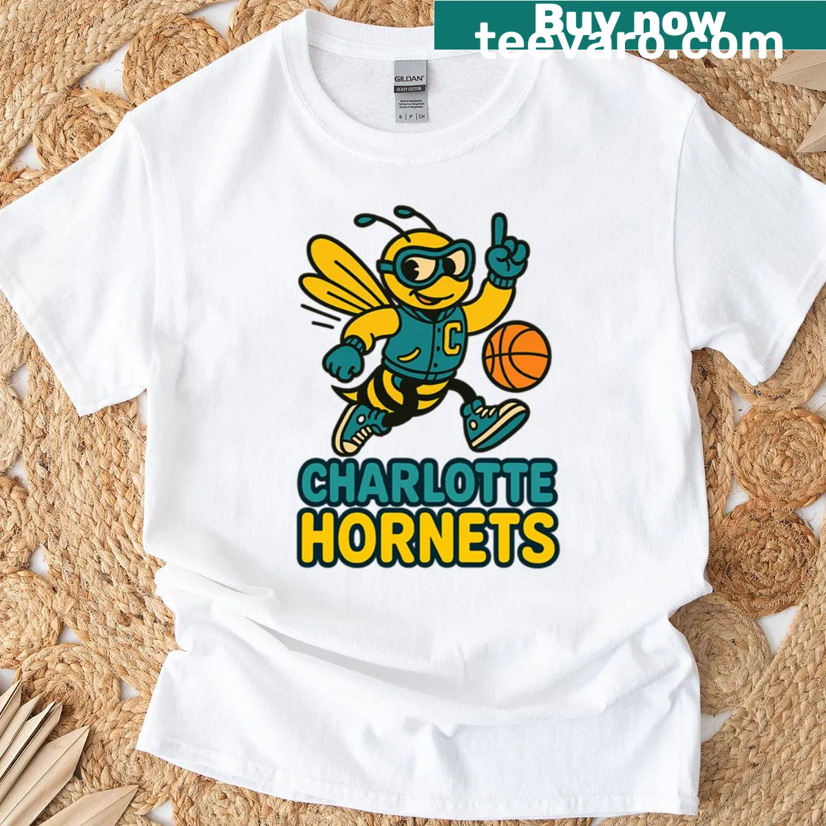 Vintage Charlotte Hornets t-shirt with retro mascot illustration — on a men's t-shirt