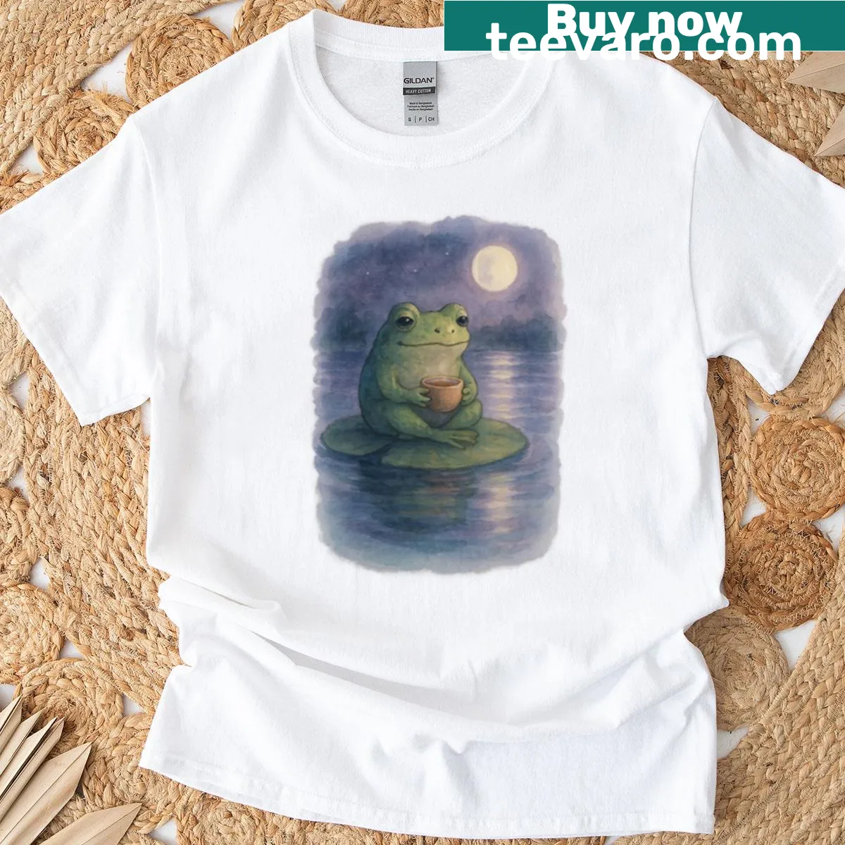 Whimsical frog drinking tea illustration on a t-shirt — on a men's t-shirt