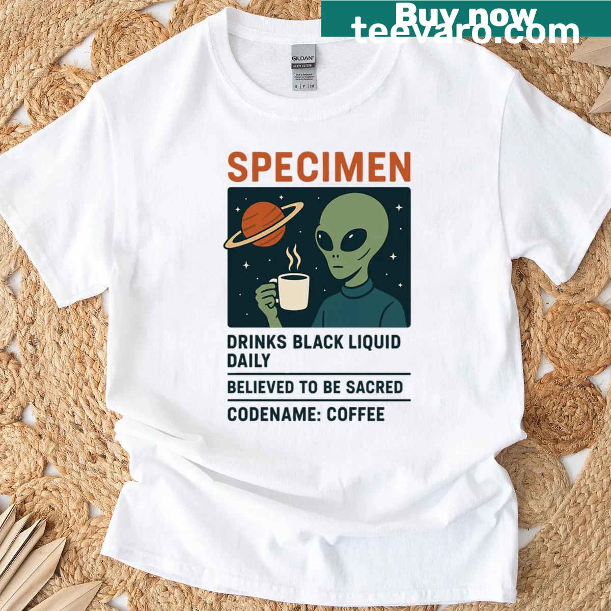 Quirky alien graphic observing humans with drinks, humorous t-shirt design. — on a men's t-shirt