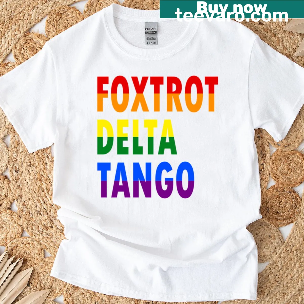 Typography t-shirt with pride flag imagery and anti-Trump message — on a men's t-shirt