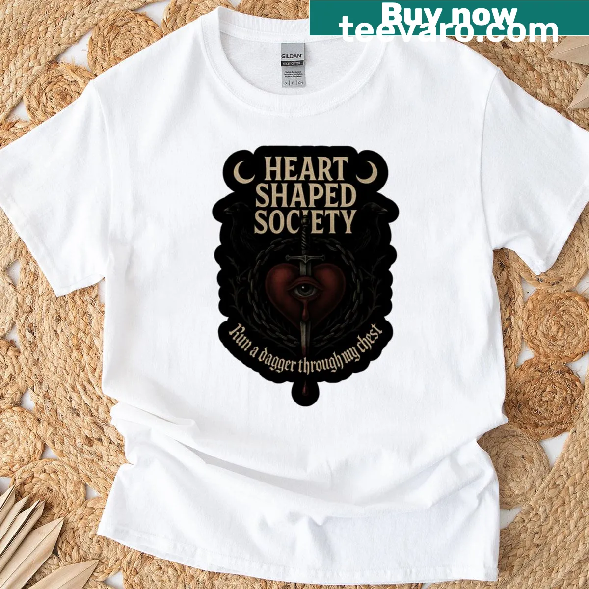 Heart and dagger design T-shirt with bold graphic illustration — on a men's t-shirt