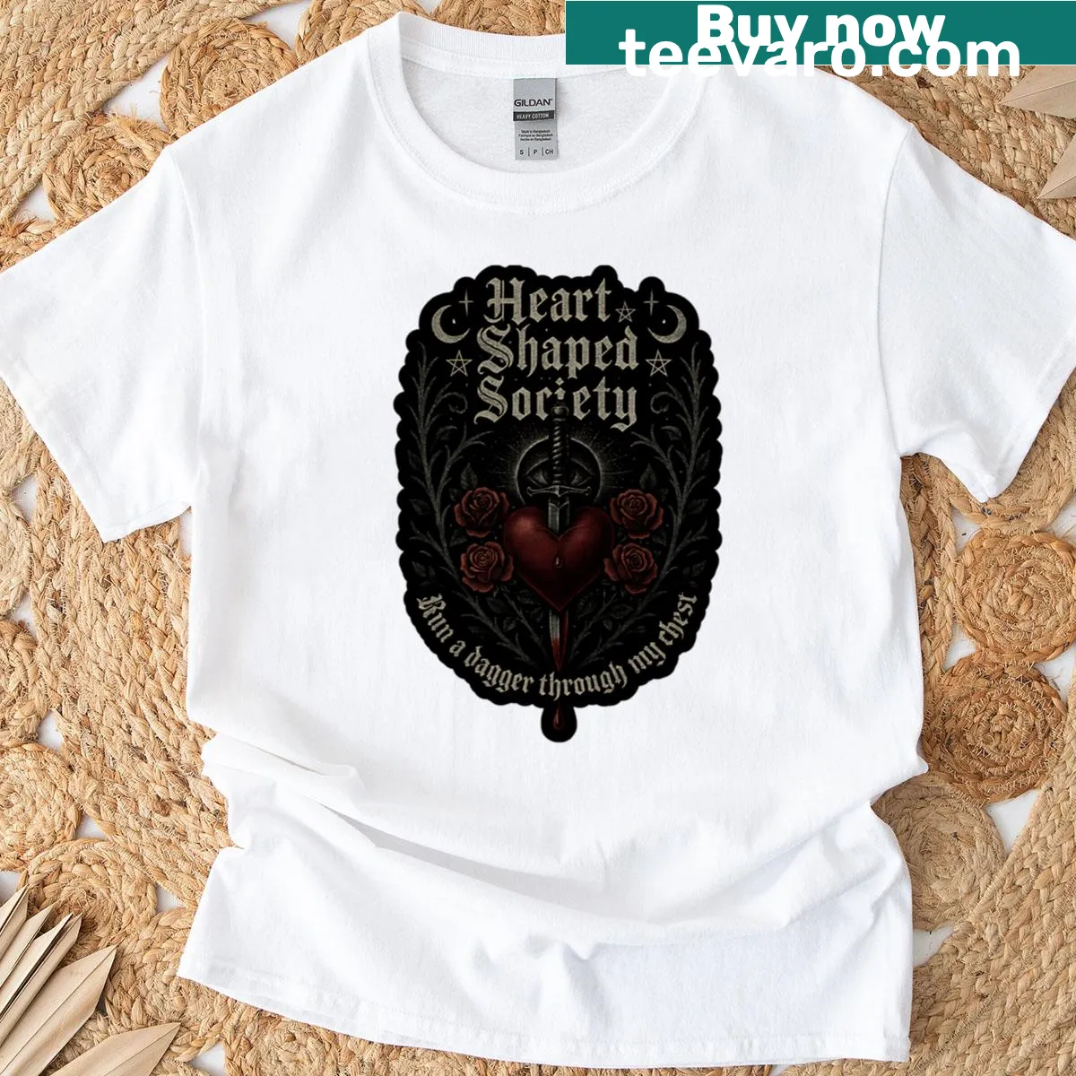 Graphic t-shirt featuring a heart and dagger design for bold expression — on a men's t-shirt