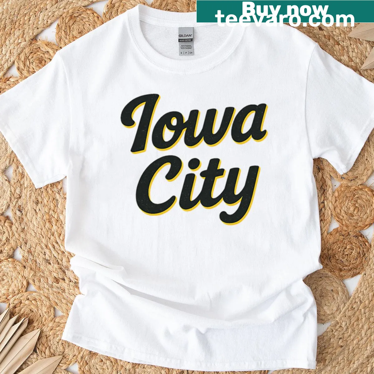Bold Iowa City college town shirt in black and gold script — on a men's t-shirt