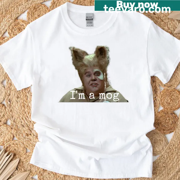 T-shirt with playful text 'John Candy Is A Mog' in bold letters.