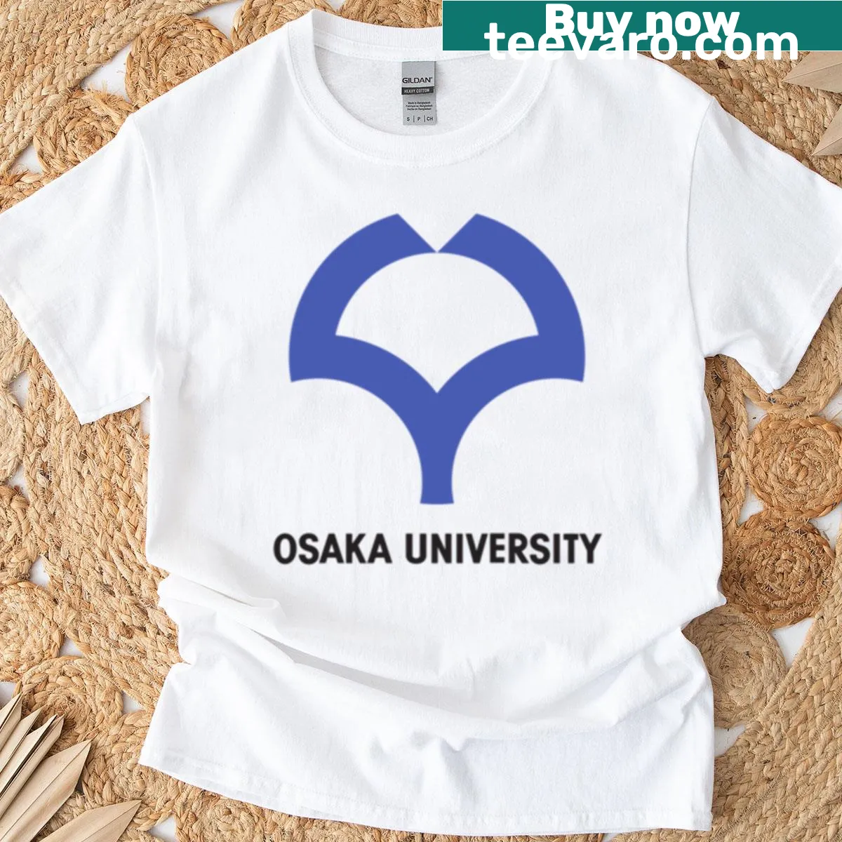 Oversized Osaka University T-shirt with minimalist typography — on a men's t-shirt