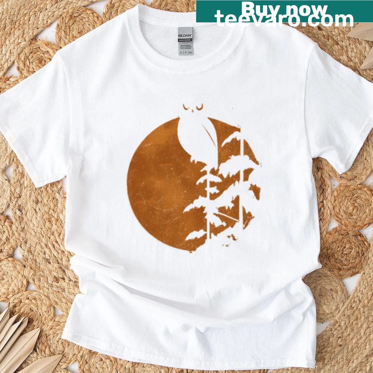 Nature-themed T-shirt with owl and moon silhouette design — on a men's t-shirt