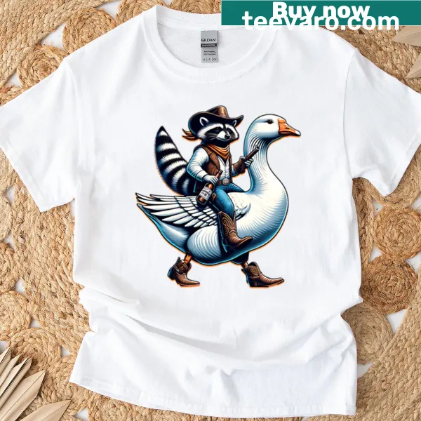 Cartoon raccoon in cowboy hat riding a goose graphic t-shirt