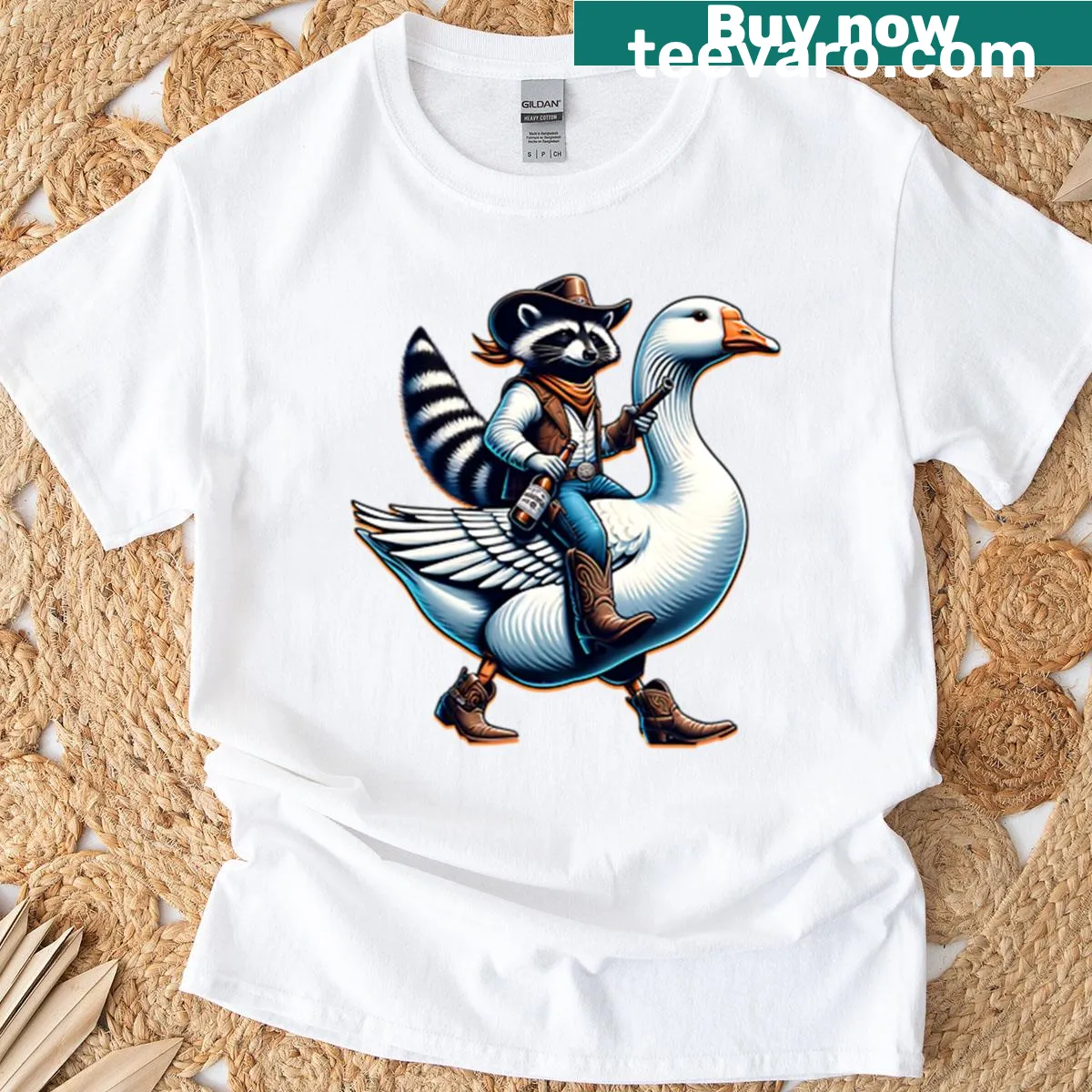 Cartoon raccoon in cowboy hat riding a goose graphic t-shirt — on a men's t-shirt