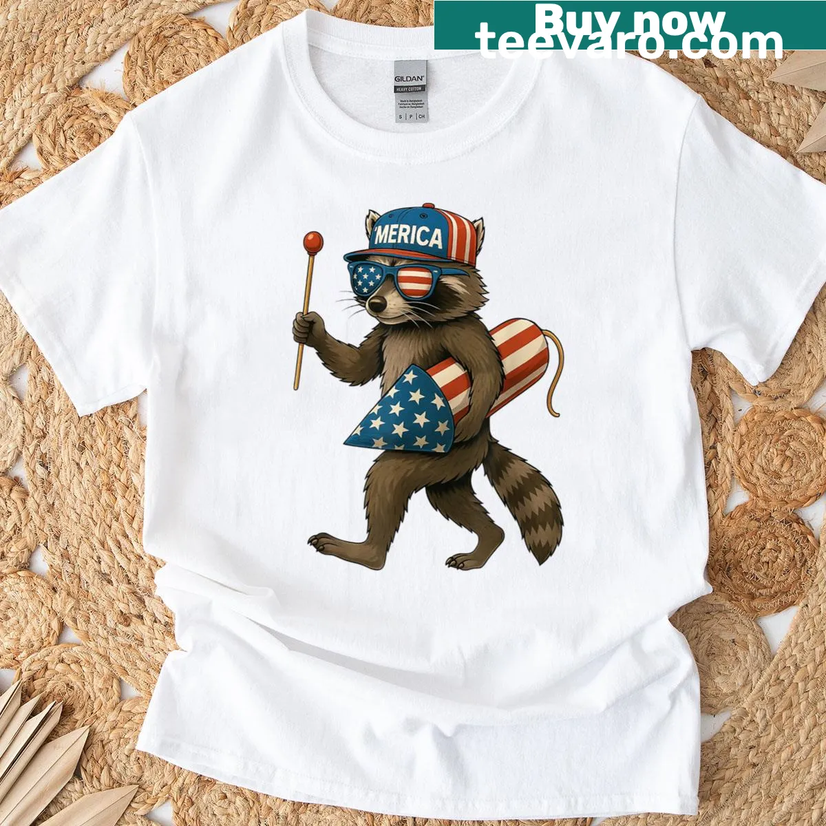 Funny raccoon with fireworks and American flag on t-shirt — on a men's t-shirt