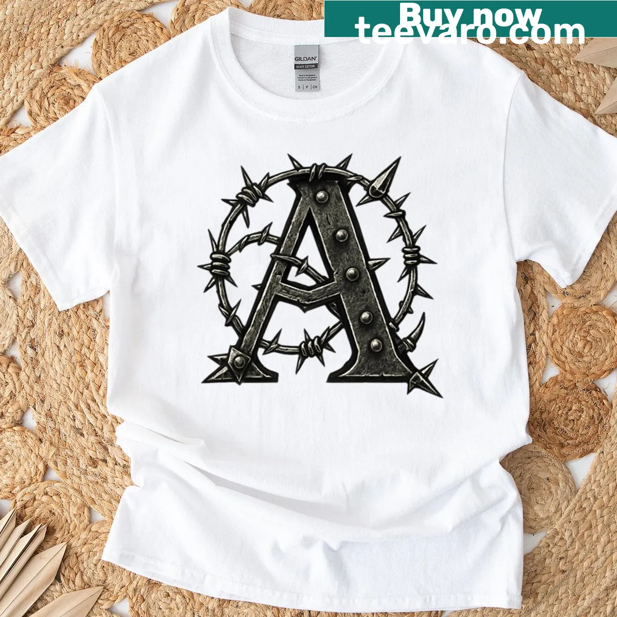 Gothic style text with barbed wire and spikes on T-shirt — on a men's t-shirt