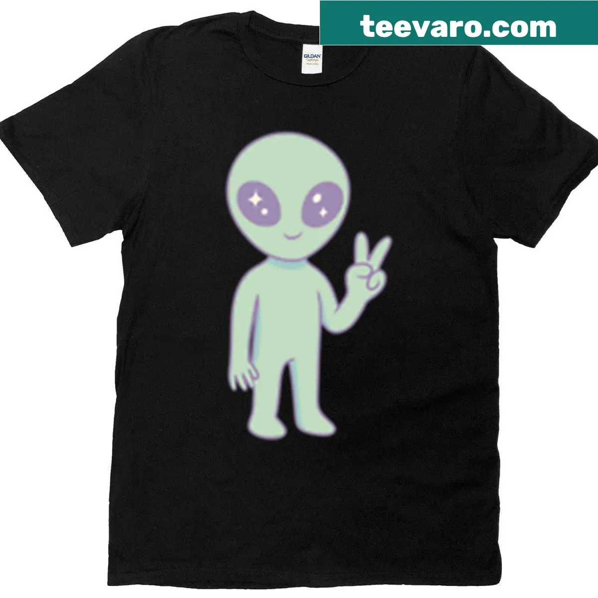 Whimsical t-shirt featuring a friendly alien and the phrase 'I Come In Peace.' — on a men's t-shirt