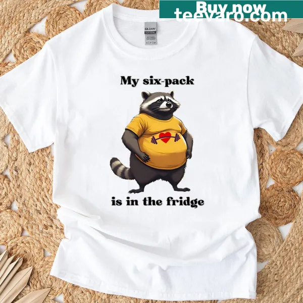 Funny T-shirt featuring a raccoon and the phrase 'My Six-pack Is In The Fridge'