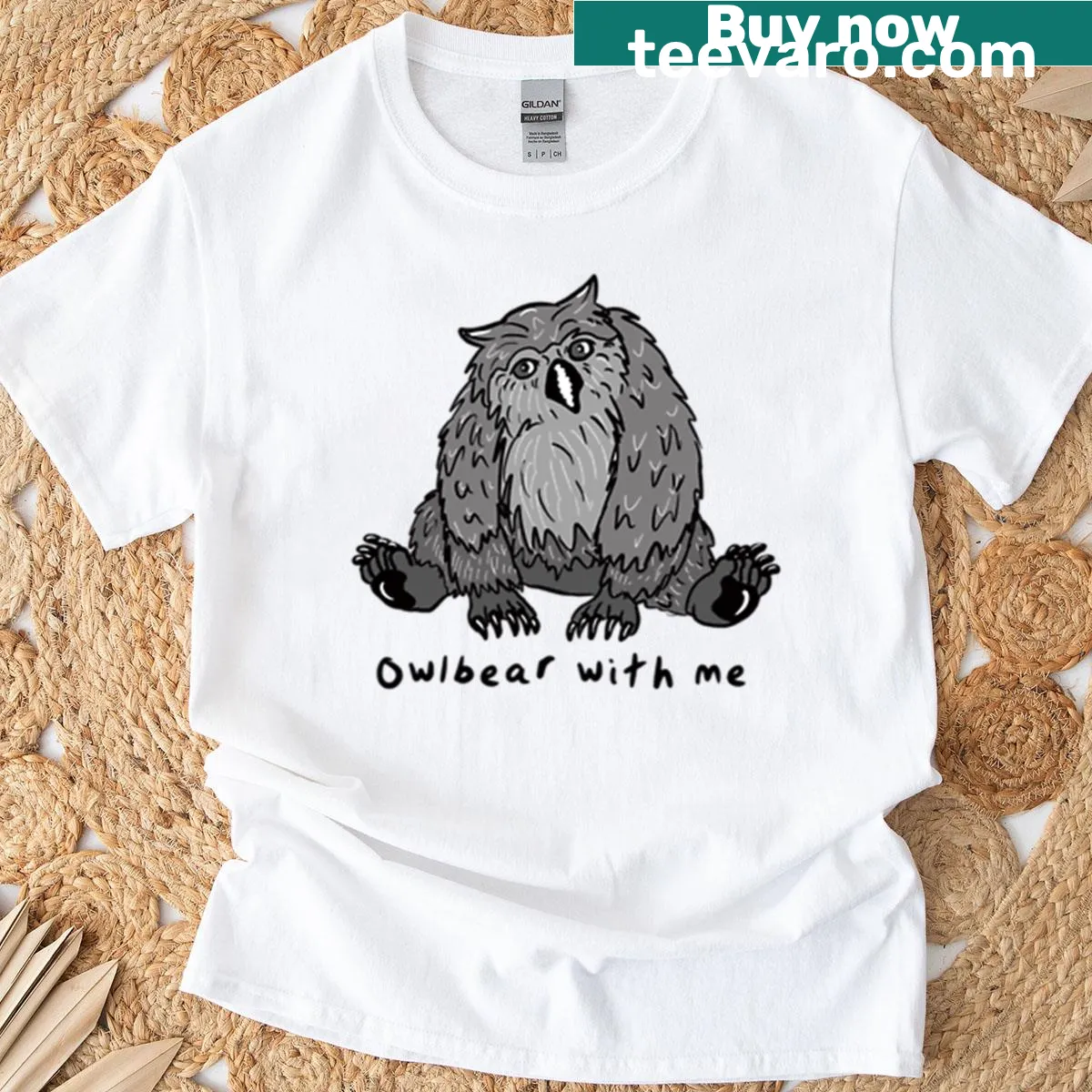 Cute illustration of an owlbear on a playful t-shirt design — on a men's t-shirt