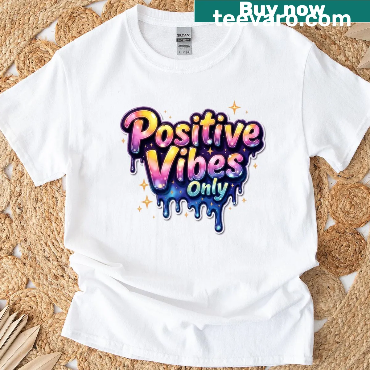 Typography t-shirt featuring the phrase Positive Vibes Only in drip lettering — on a men's t-shirt