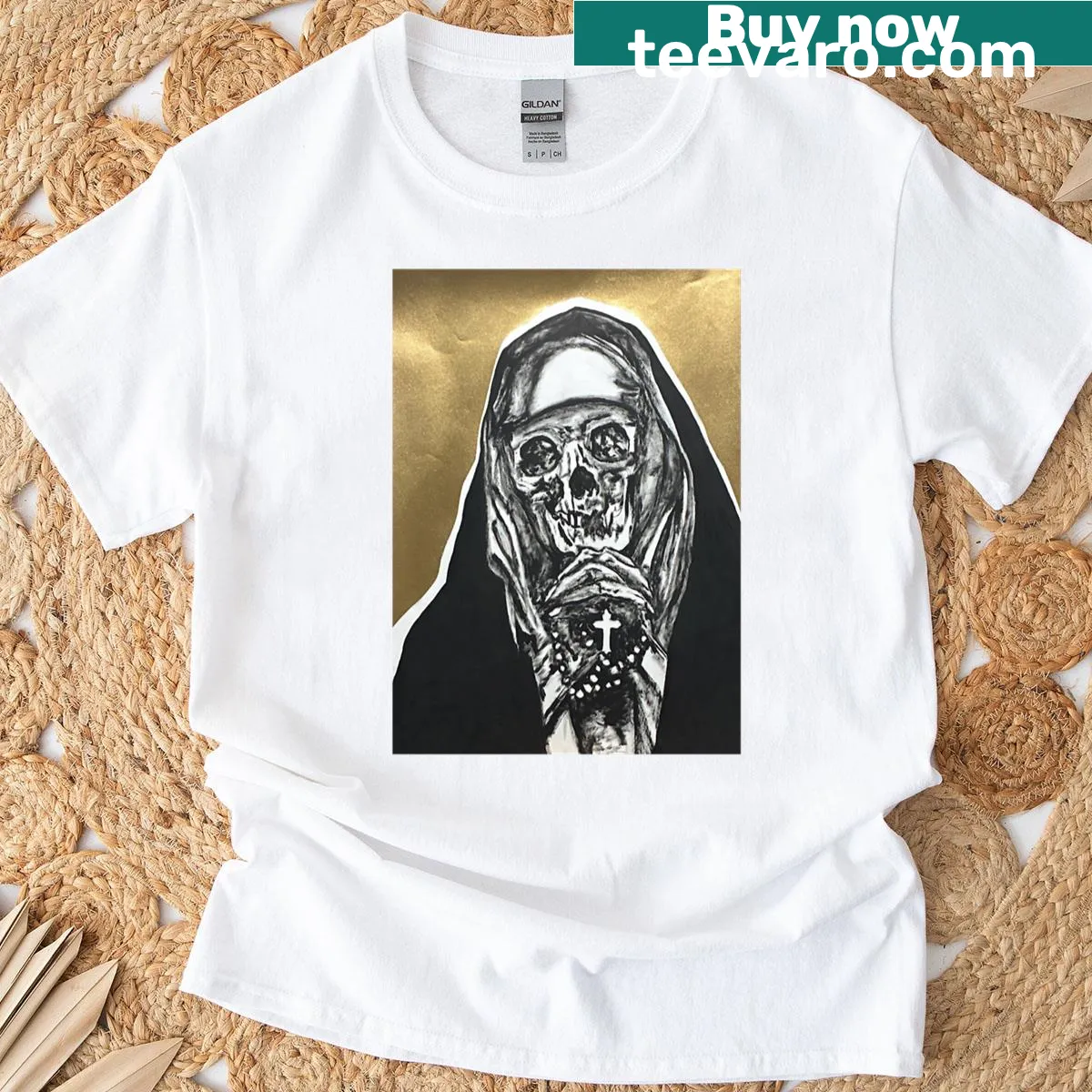 Religious skull art T-shirt featuring intricate illustrations. — on a men's t-shirt
