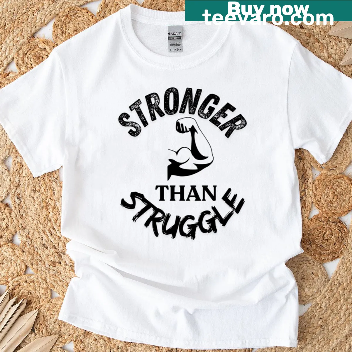 Inspirational t-shirt with the phrase 'Stronger Than Struggle' in bold typography. — on a men's t-shirt