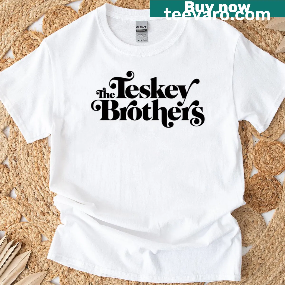 Black T-shirt featuring the Teskey Brothers logo in a sleek design — on a men's t-shirt