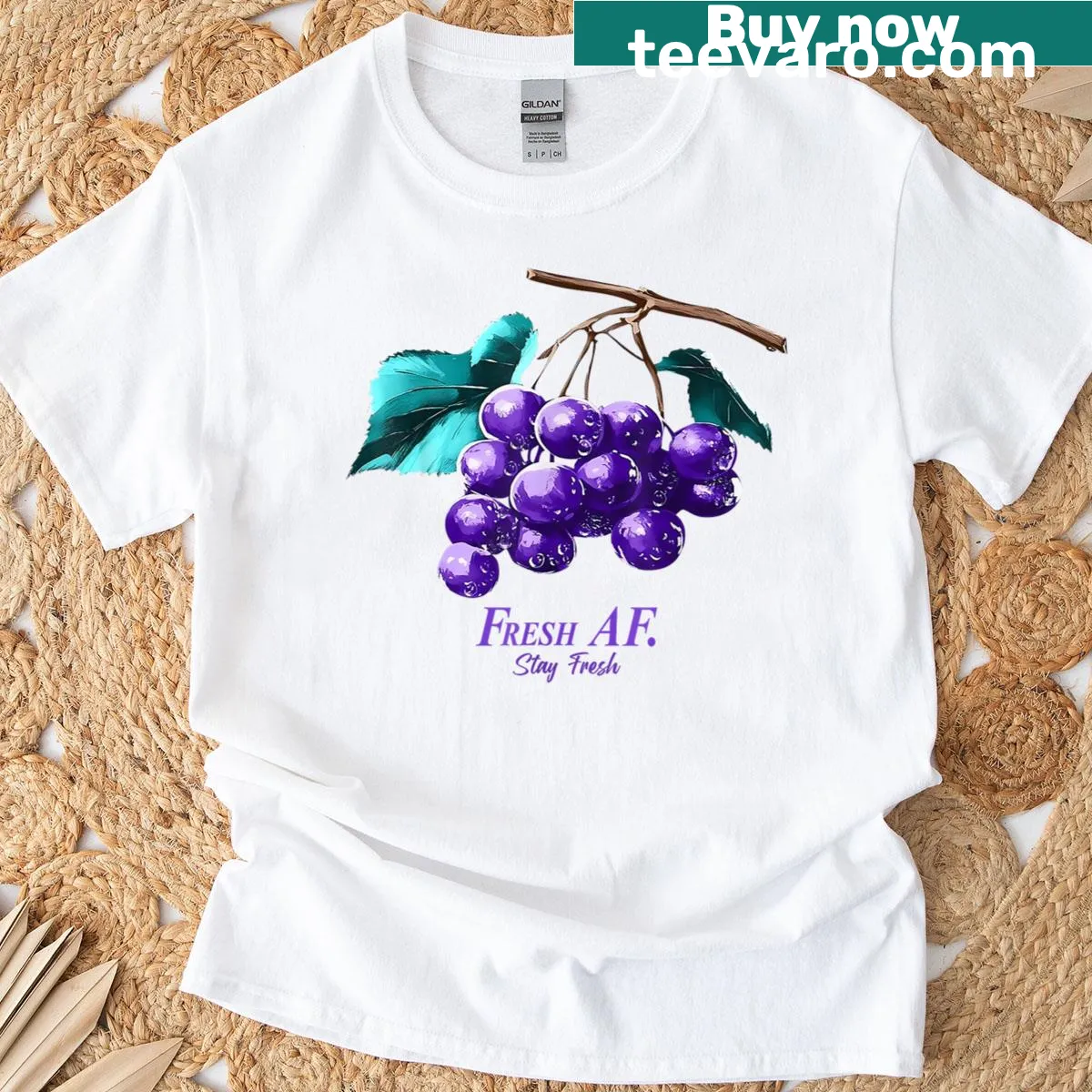Illustrative T-shirt featuring playful grapes design — on a men's t-shirt