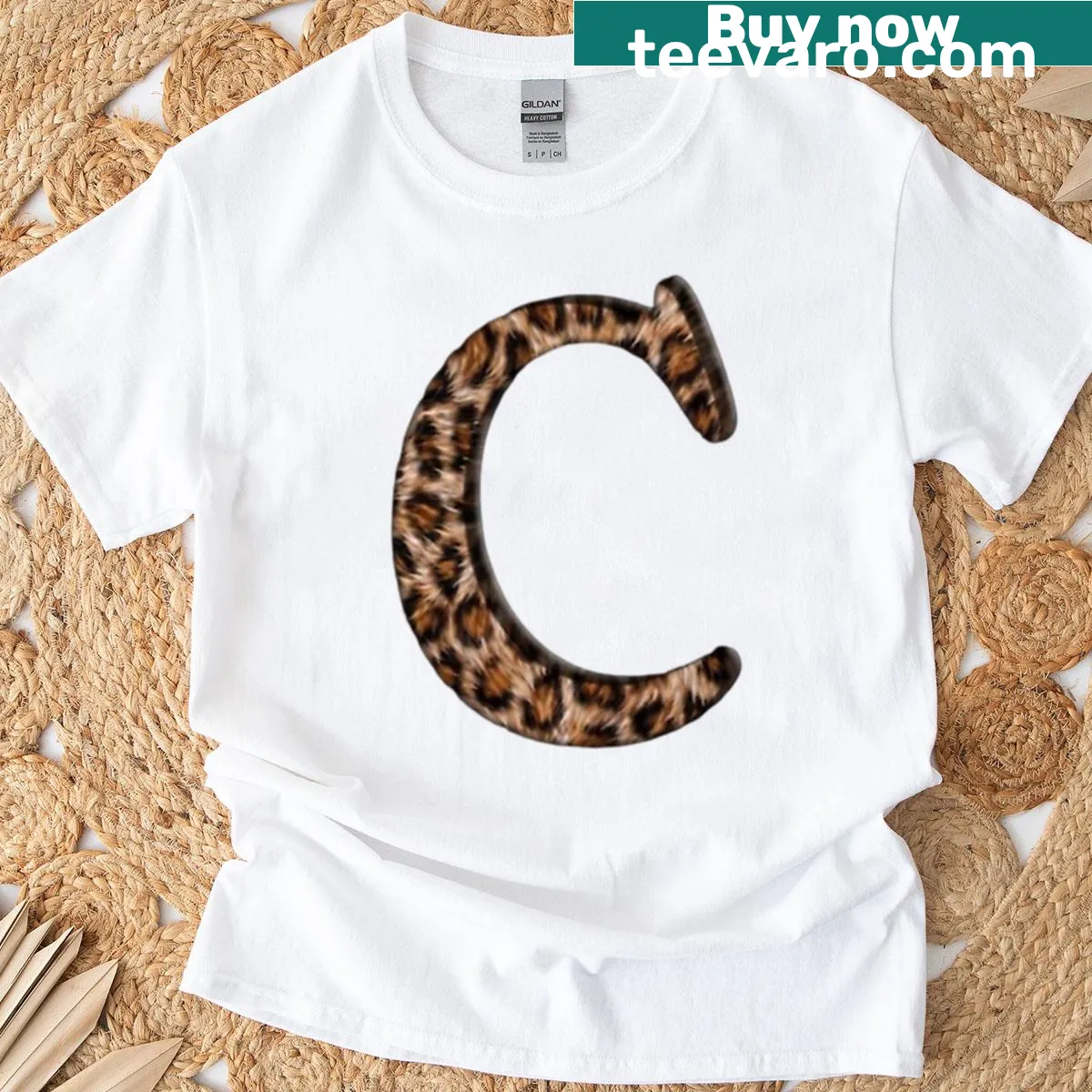Leopard print t-shirt featuring bold letter C design — on a men's t-shirt