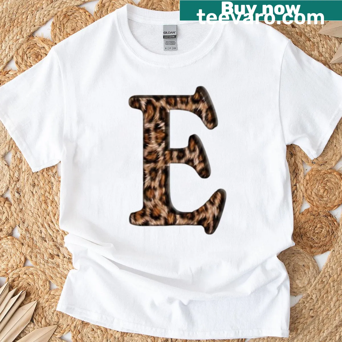 Leopard print letter 'E' graphic on t-shirt — on a men's t-shirt