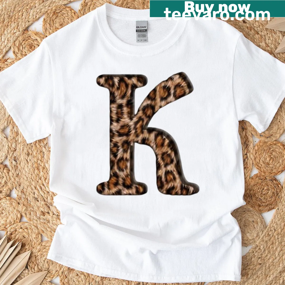 Leopard print T-shirt featuring a bold letter K design — on a men's t-shirt