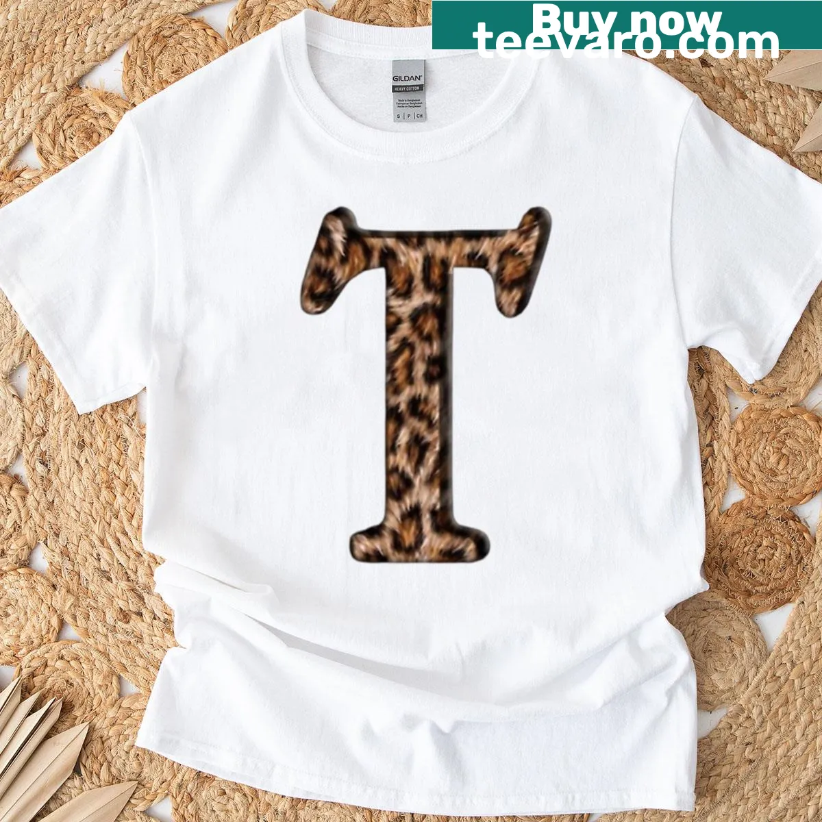 Leopard print T-shirt featuring a bold letter T design — on a men's t-shirt