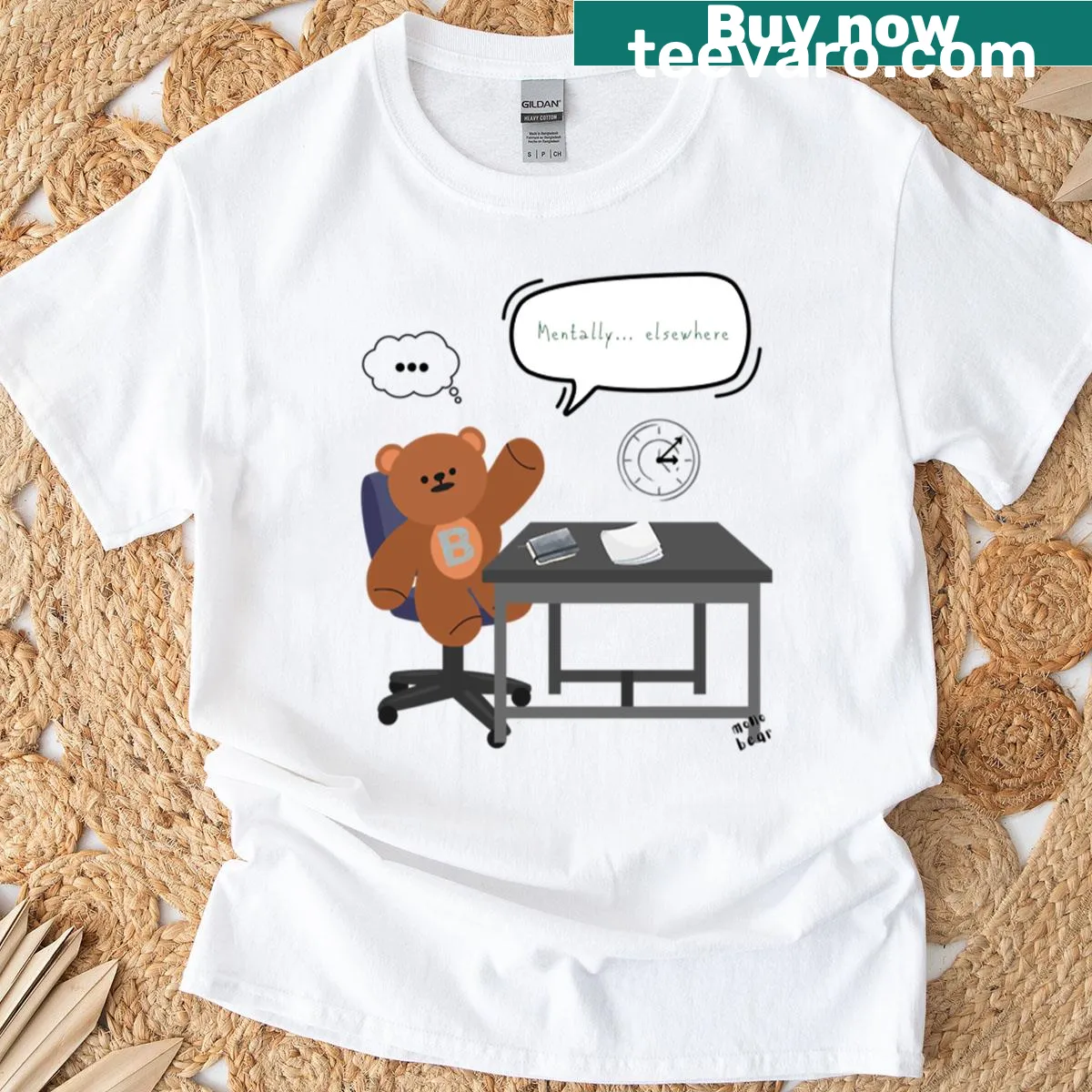 Whimsical graphic T-shirt featuring a distracted bear at a desk — on a men's t-shirt