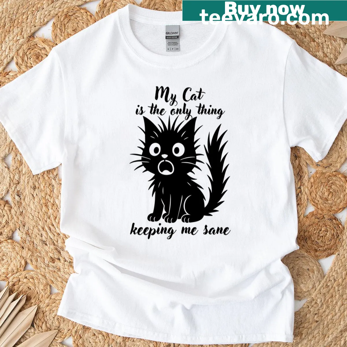 T-shirt featuring the phrase 'My Cat Is The Only Thing Keeping Me Sane'. — on a men's t-shirt