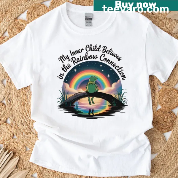 Whimsical t-shirt with the phrase My Inner Child Believes In The Rainbow Connection printed on it.