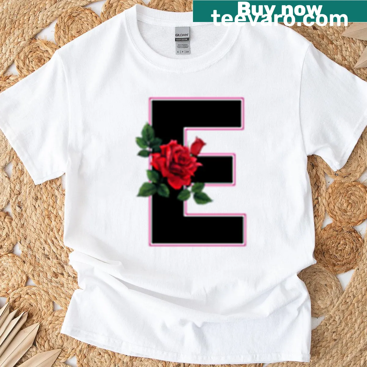 T-shirt with a rose and decorative initial letter design — on a men's t-shirt