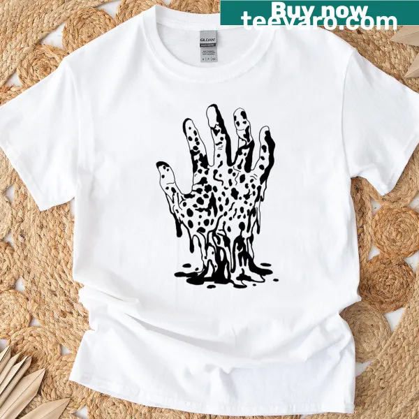 Graphic of a rotting hand on a T-shirt, evoking horror themes.
