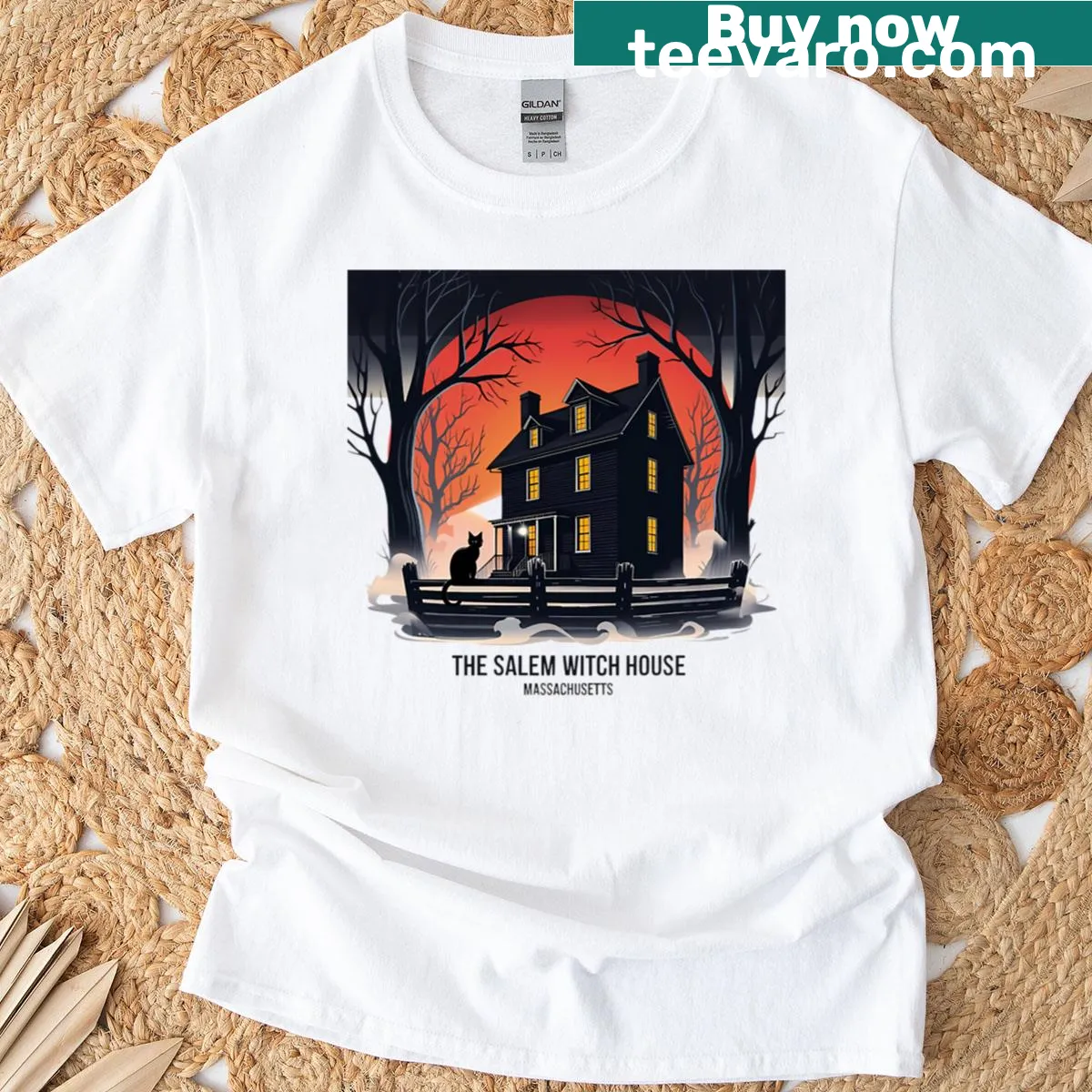 Retro t-shirt featuring the Salem Witch House in a sunset illustration — on a men's t-shirt