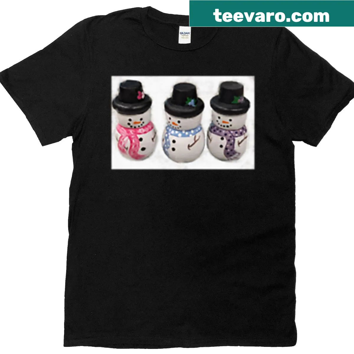 T-shirt featuring three playful cartoon Snowmigos — on a men's t-shirt