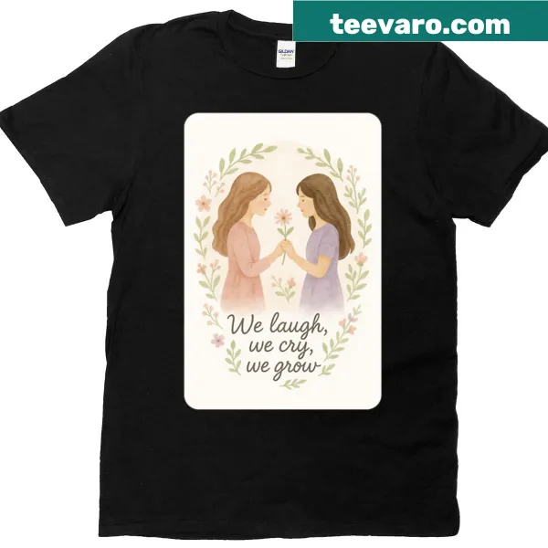 Watercolor art T-shirt with the phrase 'We Laugh We Cry We Grow'