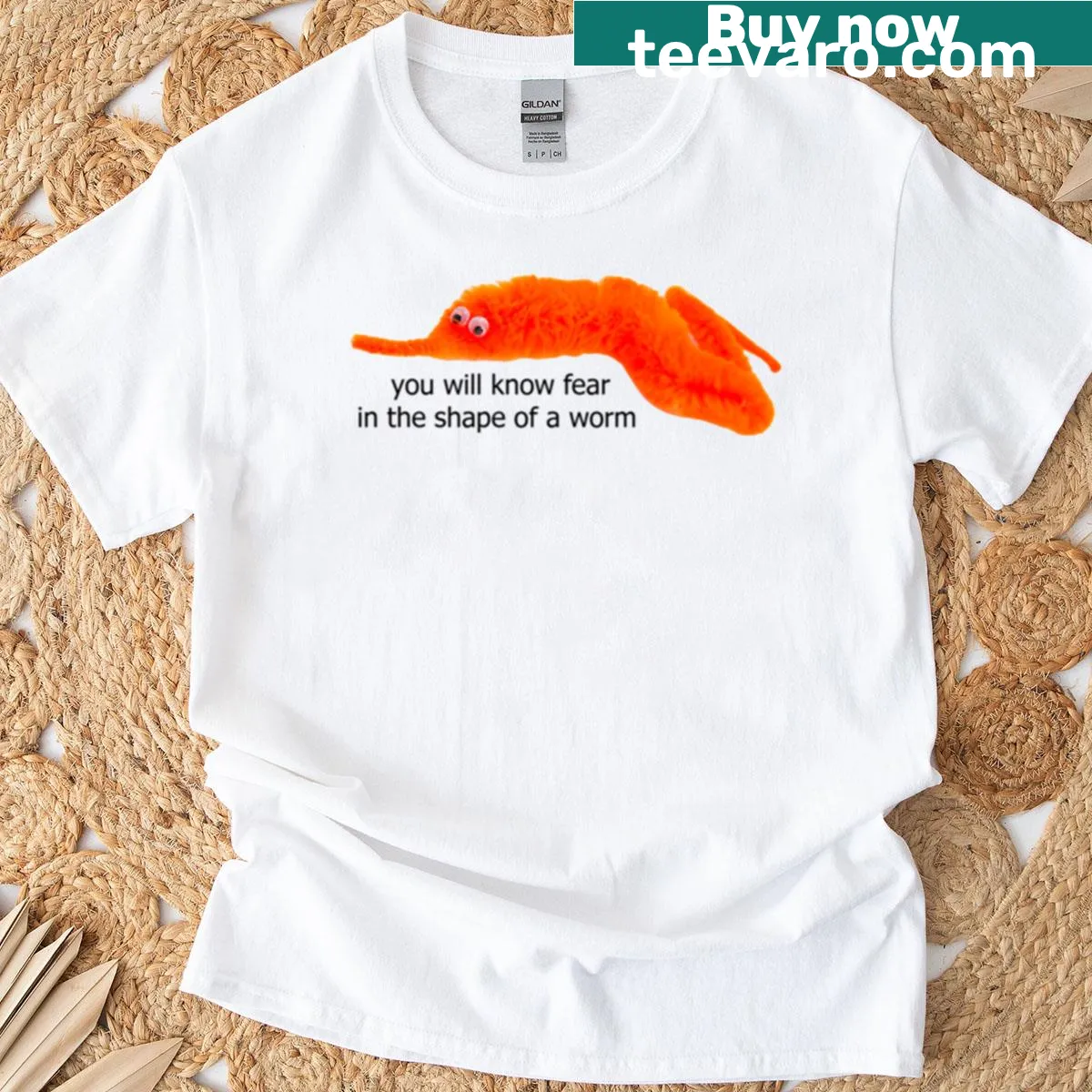 Edgy T-shirt featuring a worm on a string with quirky text — on a men's t-shirt