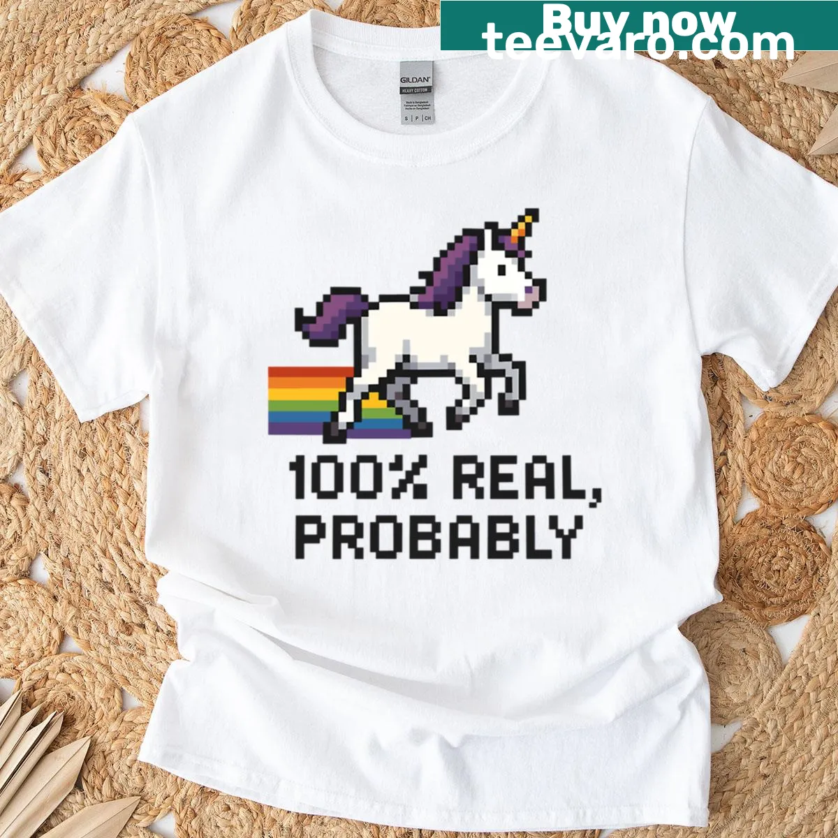 Pixelated unicorn shirt with a rainbow trail design — on a men's t-shirt