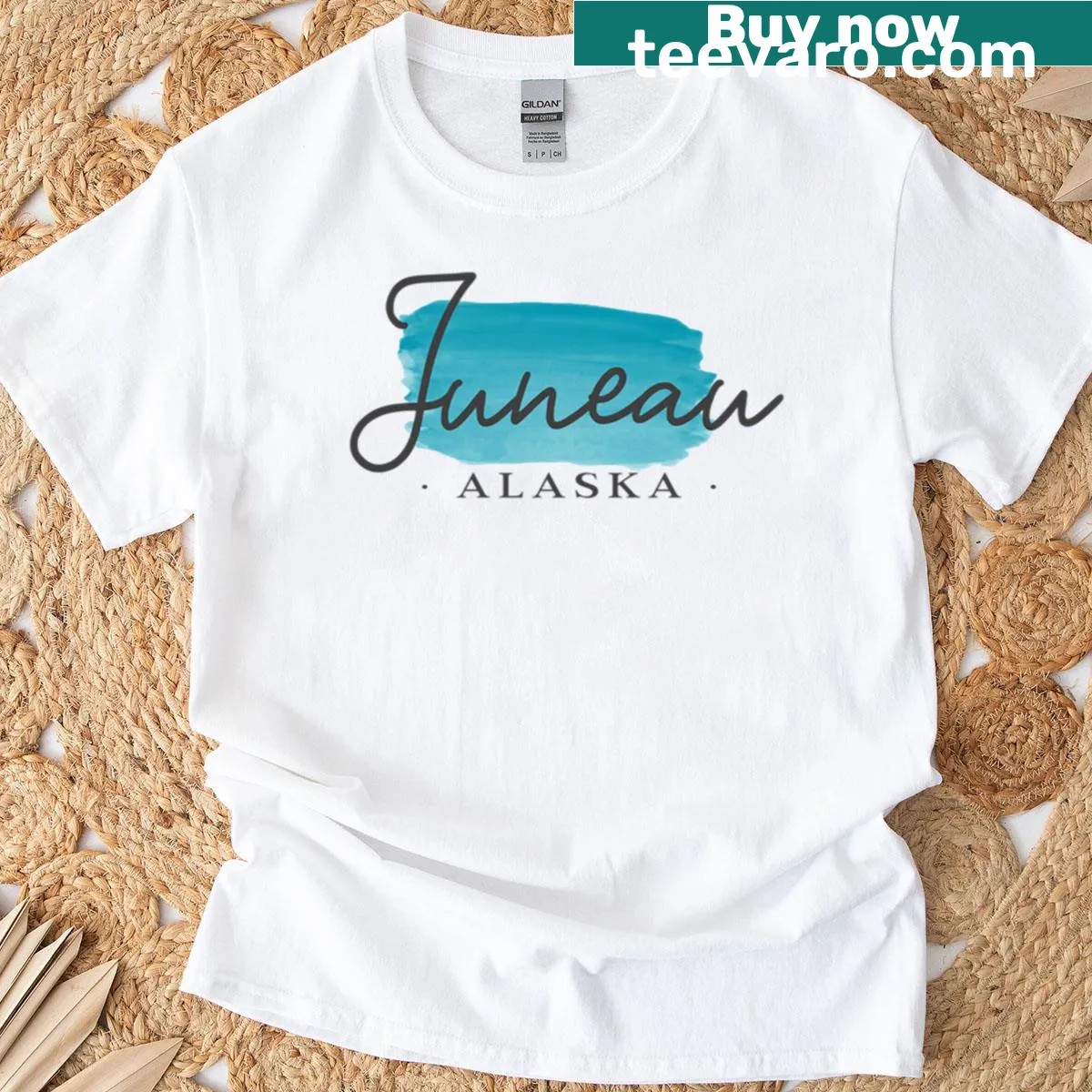 T-shirt featuring an illustration of Juneau, Alaska landscapes. — on a men's t-shirt