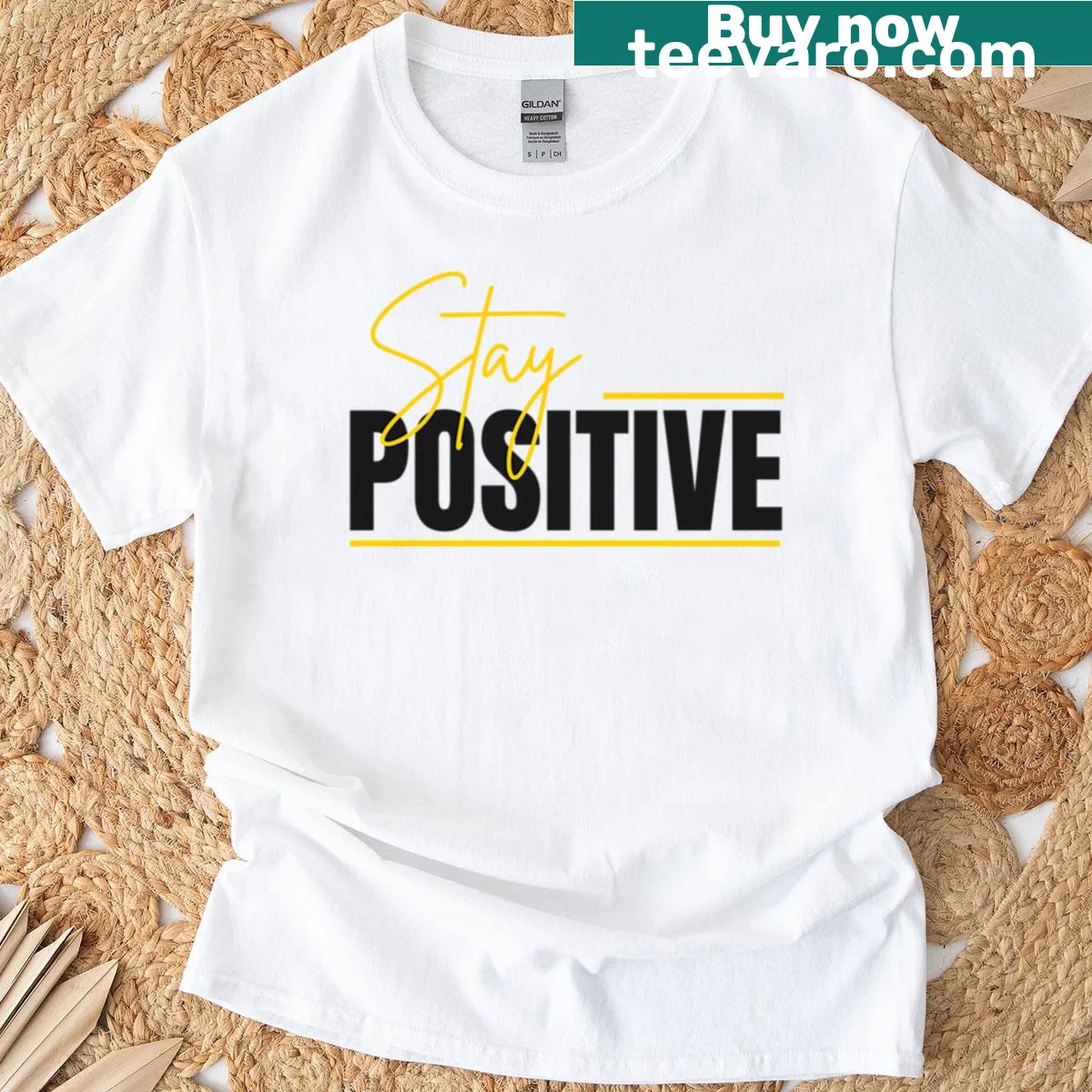 Stay Positive motivational quote graphic T-shirt — on a men's t-shirt
