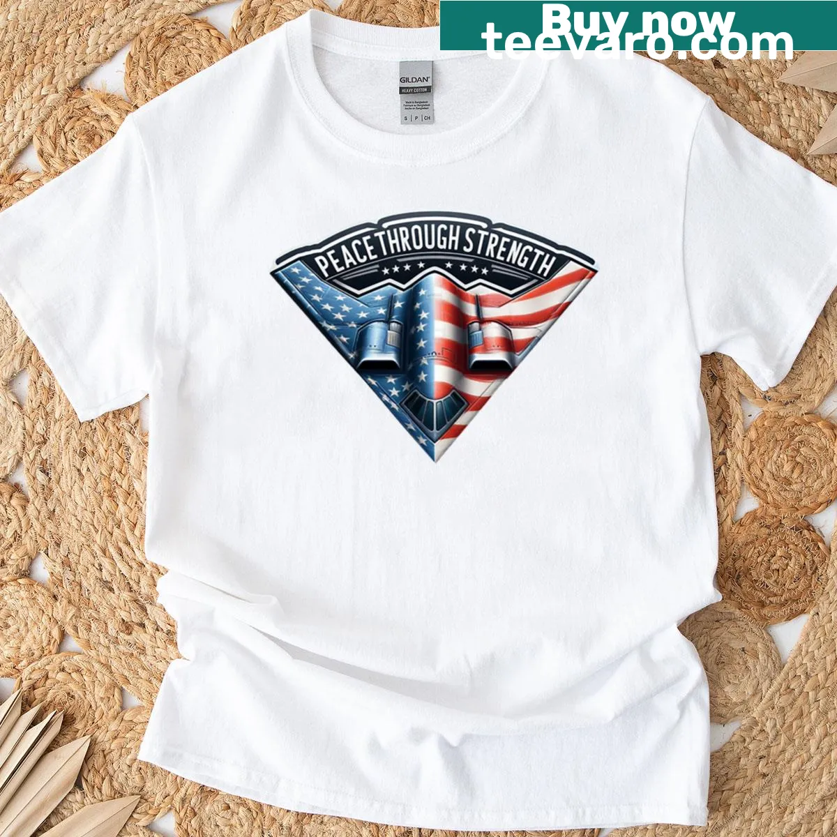 Illustrated B-2 Bomber t-shirt featuring the phrase 'Peace Through Strength.' — on a men's t-shirt
