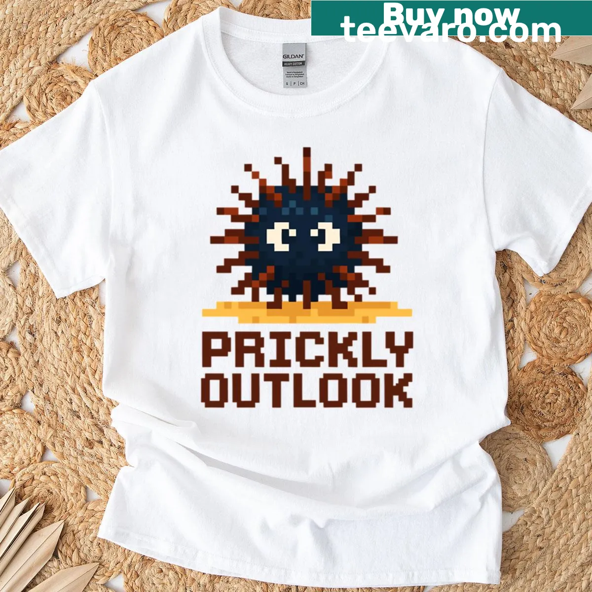 Pixel art sea urchin T-shirt design with seabed illustration — on a men's t-shirt