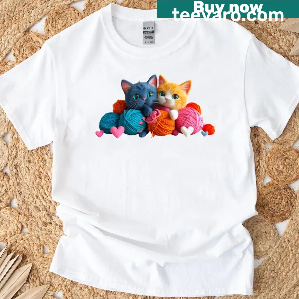 Whimsical cats in a yarn wonderland graphic on T-shirt