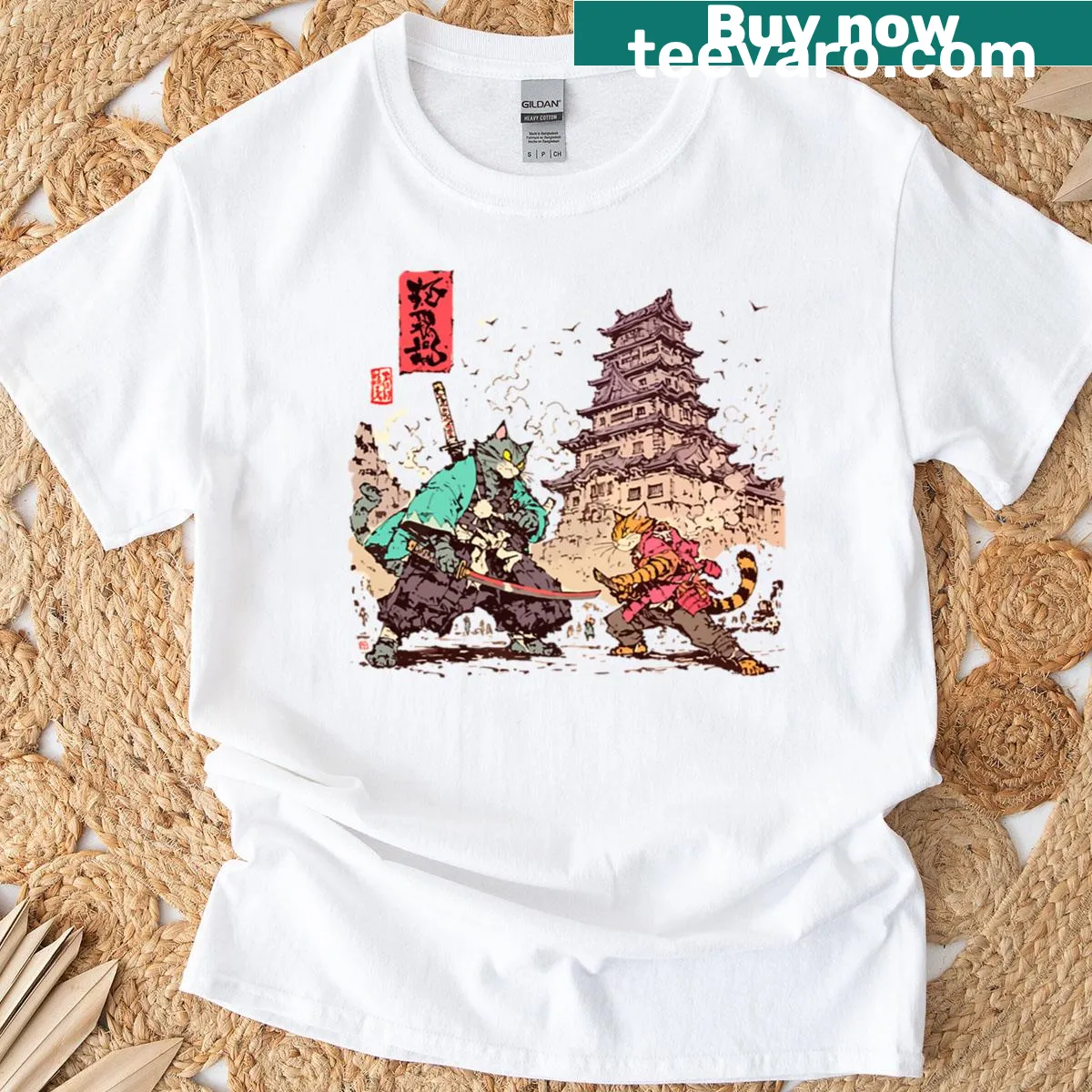 Illustrative T-shirt featuring samurai cats dueling at a castle — on a men's t-shirt
