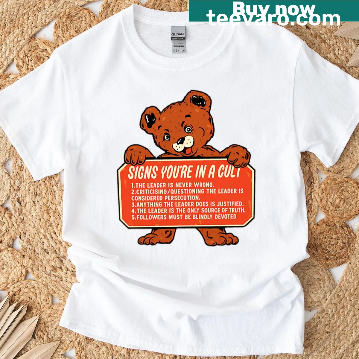 Funny bear graphic t-shirt with satirical text about cult-like behavior — on a men's t-shirt