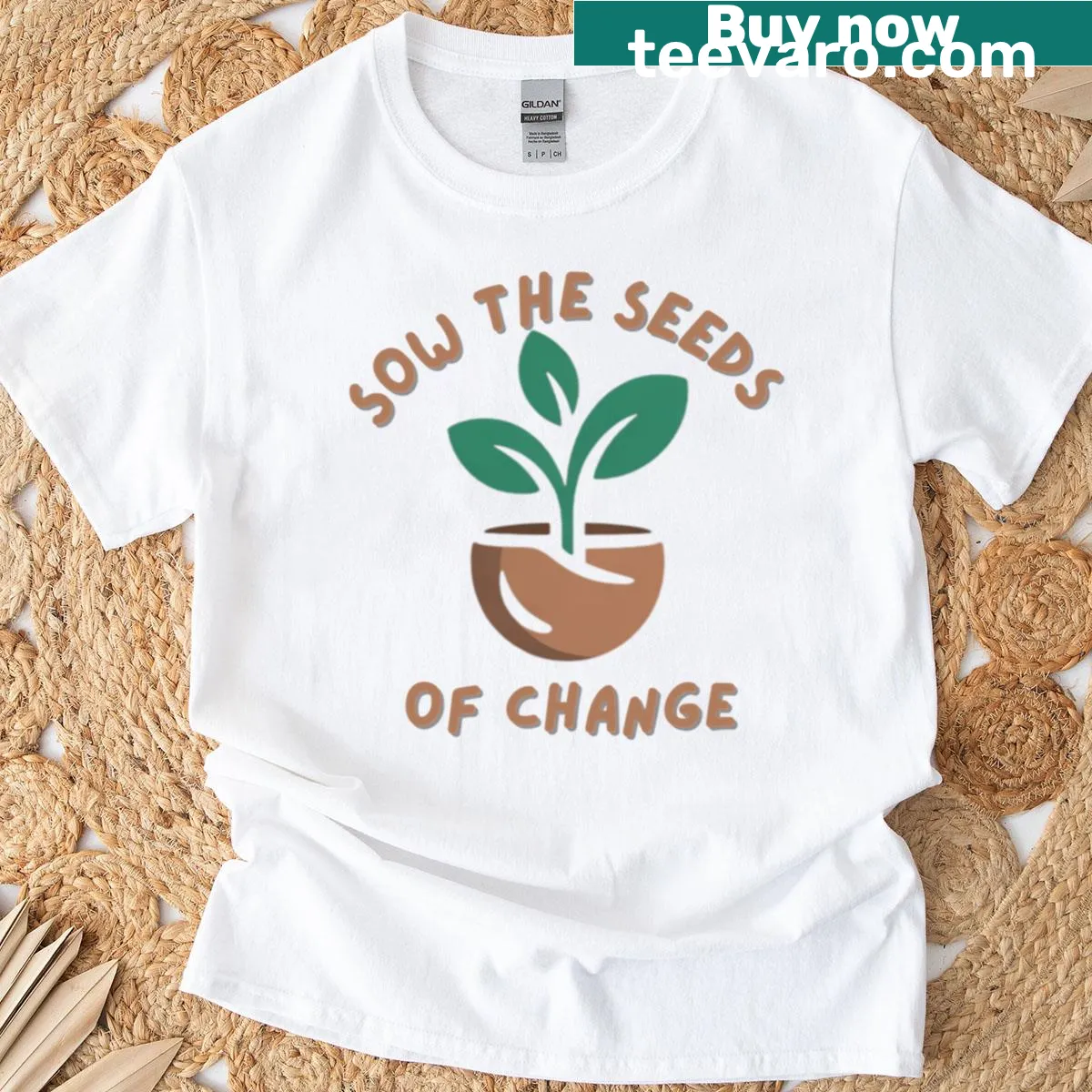 Graphic T-shirt featuring seeds sprouting for change — on a men's t-shirt