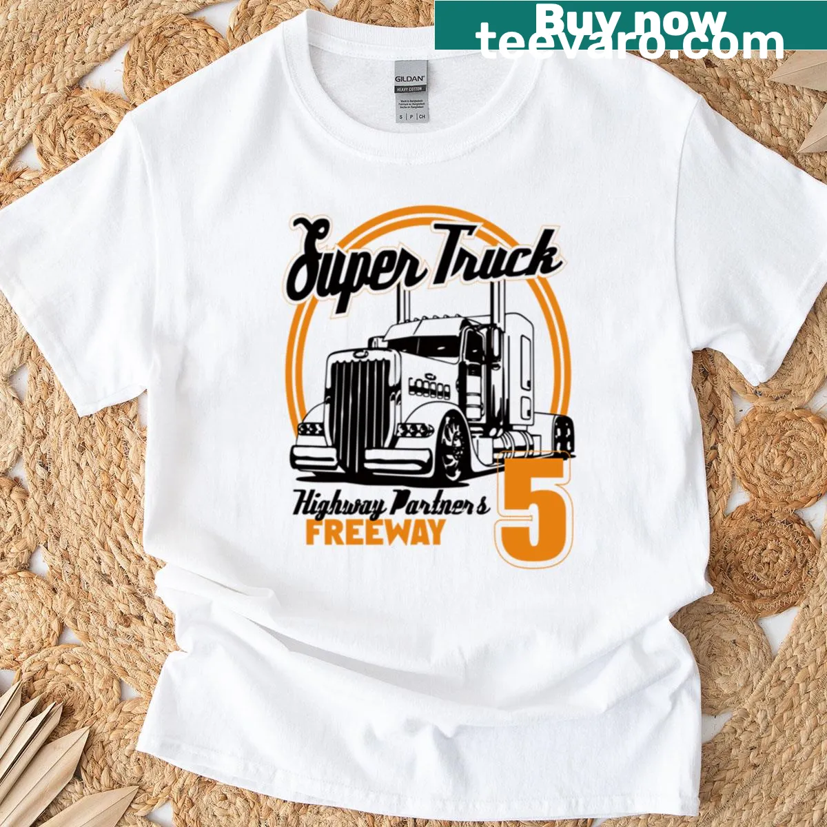 Badge-emblem t-shirt celebrating trucking and highway adventures — on a men's t-shirt