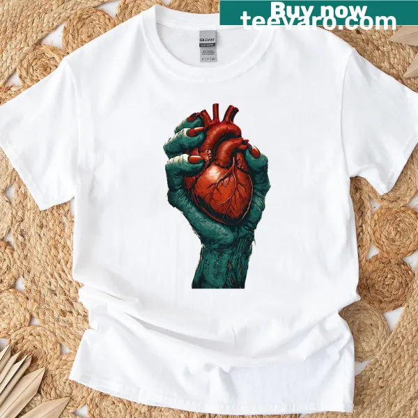 Cartoon T-shirt featuring a zombie hand holding a heart for Halloween
