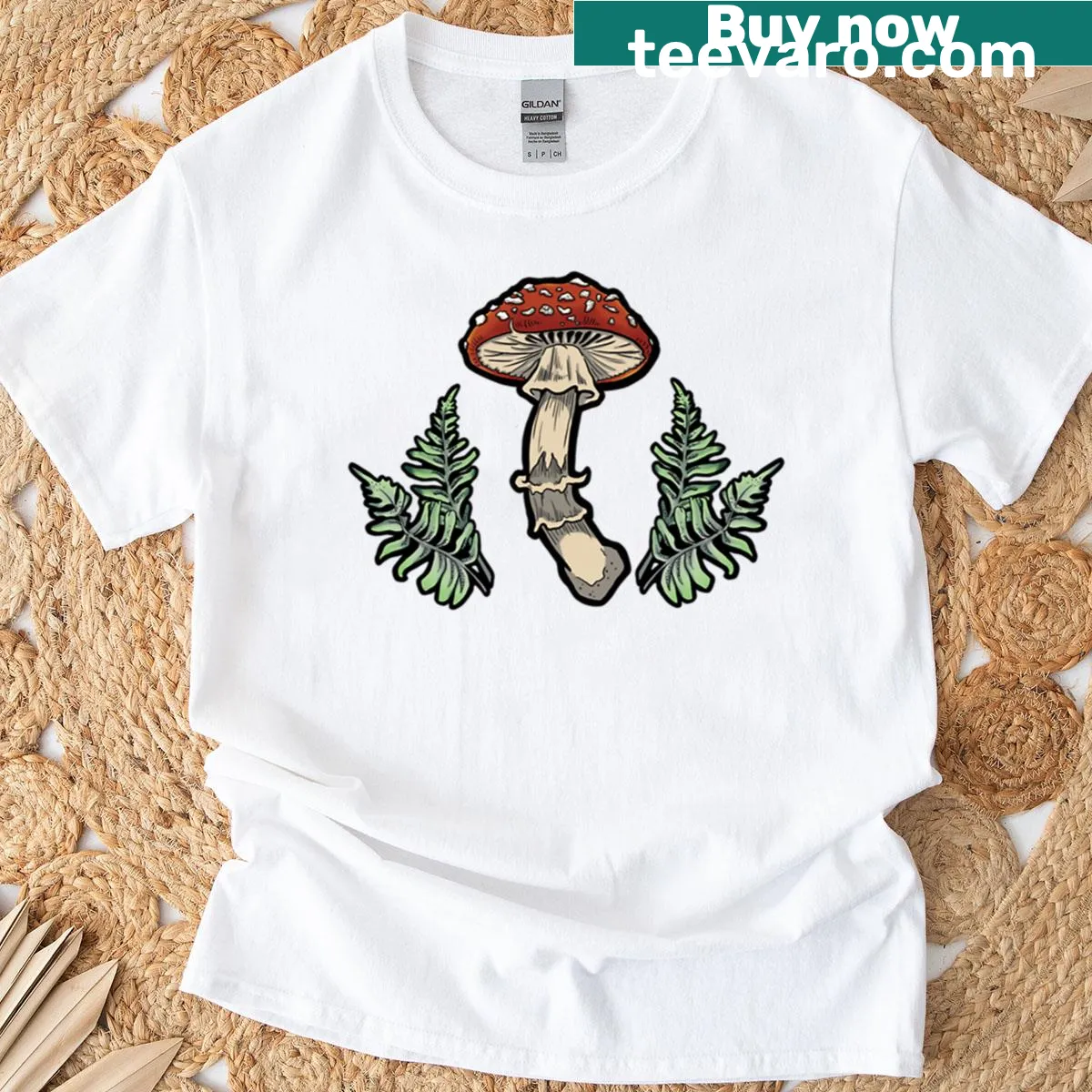 Amanita mushroom illustration surrounded by ferns on a T-shirt — on a men's t-shirt